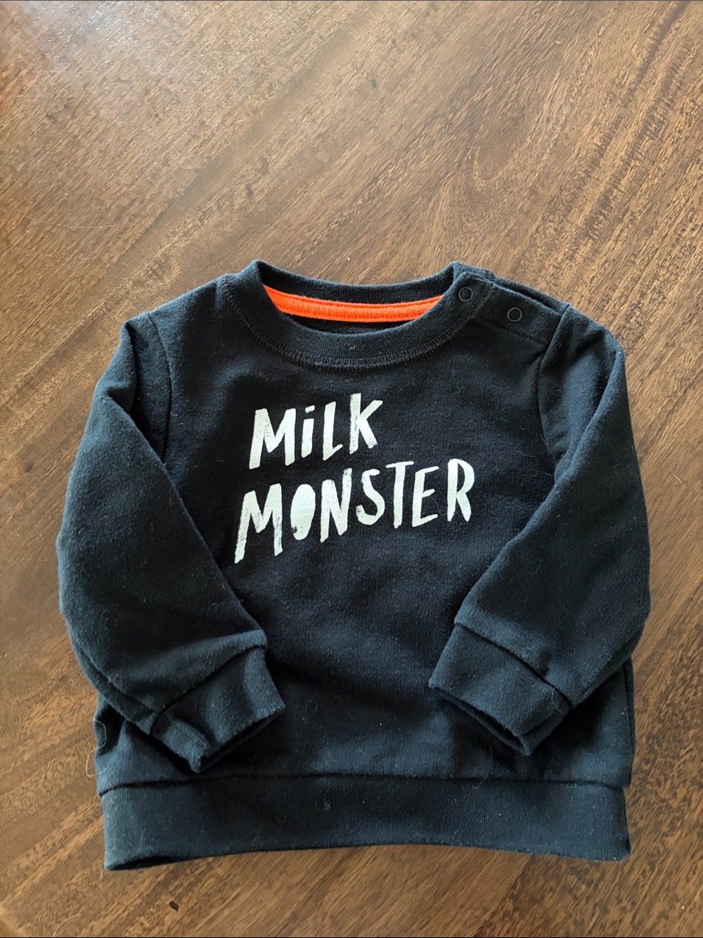 Cat & Jack Black Sweatshirt with White “Milk Monster” Graphic and Orange Trim